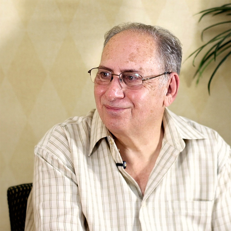 Bob, a stroke survivor and Kandu Health program participant, smiling as he reflects on his recovery journey.