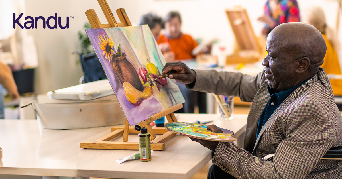 Stroke survivor engaging in painting as part of a rehabilitation program, promoting creativity and cognitive recovery.